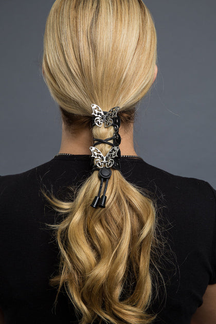 4"Lace Up Tribal Buttlerfly: Description
All Hair Gloves® come in snaps for easy use with elastic band and hook for non-slip 